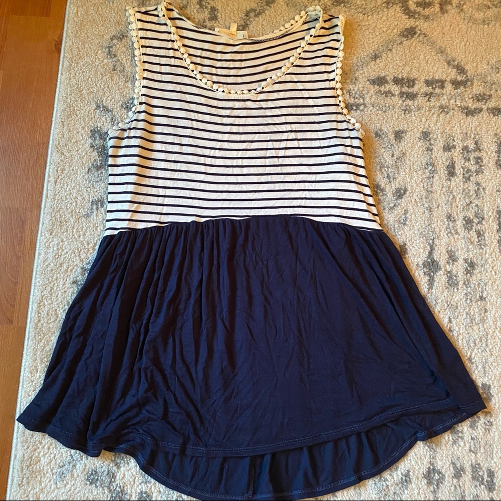 Boutique tank top with ruffled bottom